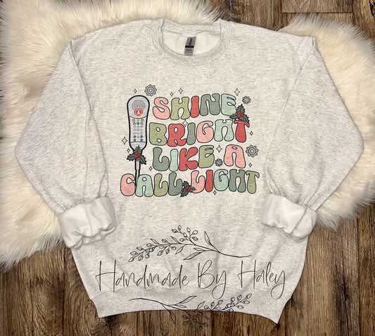 Shine Bright Call Light Crewneck