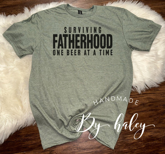 Surviving Fatherhood T-Shirt